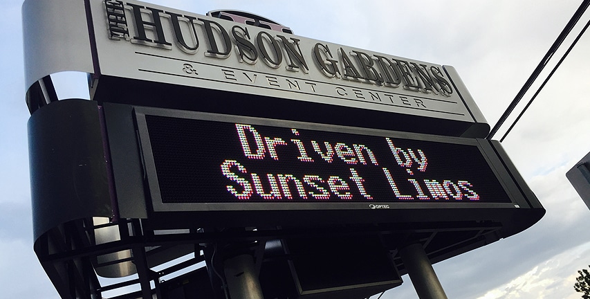 Hudson Gardens signs that reads, "Driven by Sunset Limos"